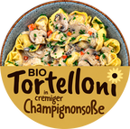 Bio Tortellini in cremiger Champignonsoße